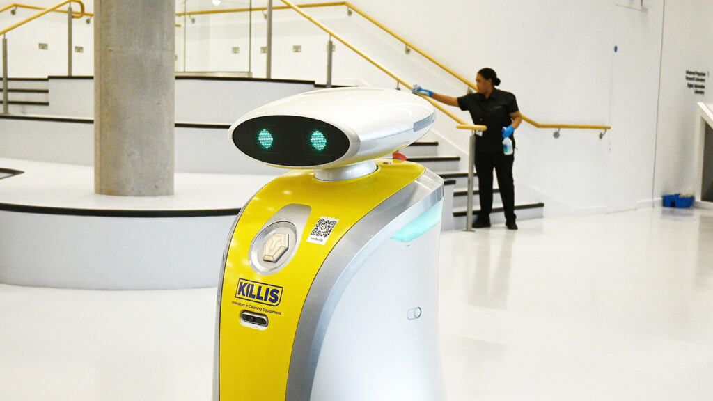 A robotic cleaner working alongisde a NuServe operative.