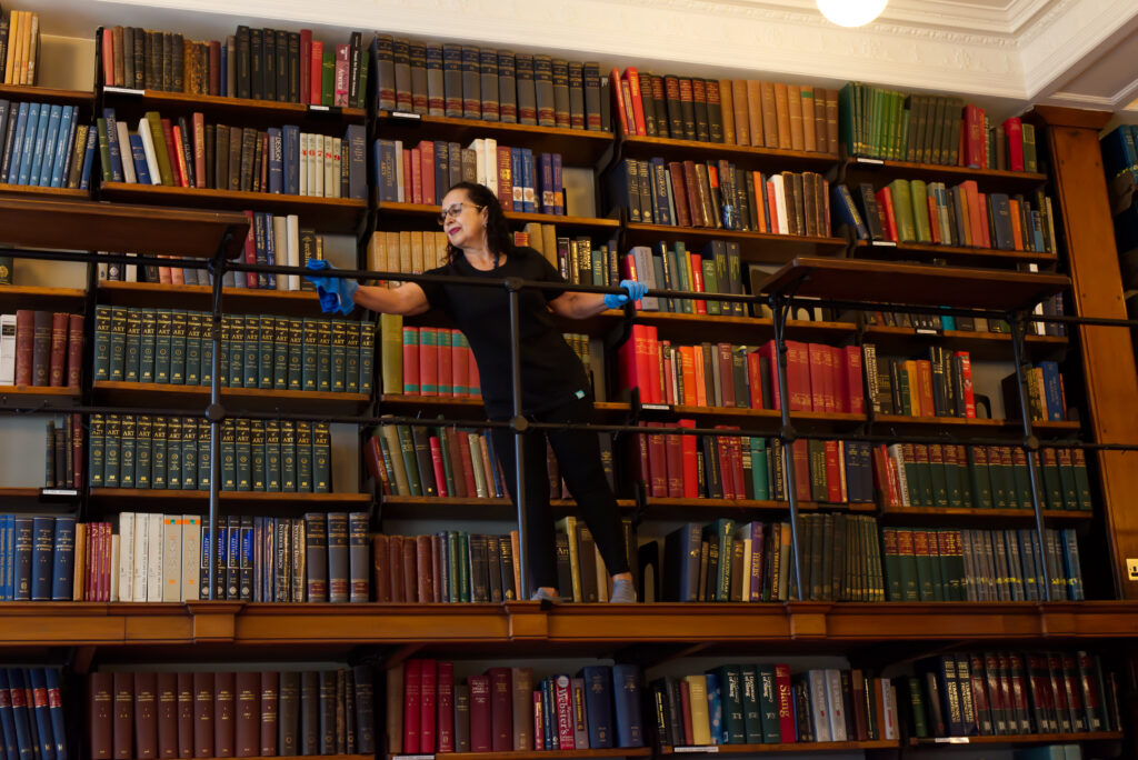 a NuServe cleaner cleaning a library.